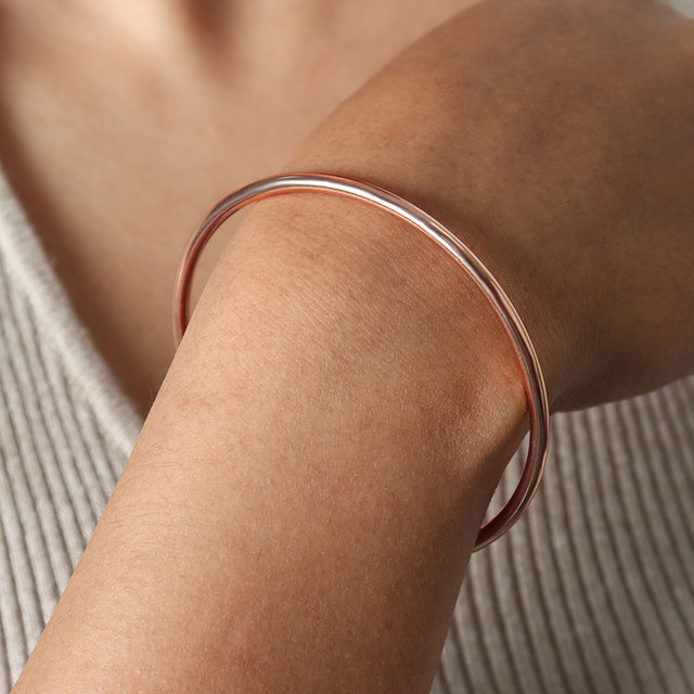 Timeless Elegance: The Simple Gold Bangle