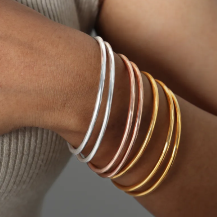 Timeless Elegance: The Simple Gold Bangle