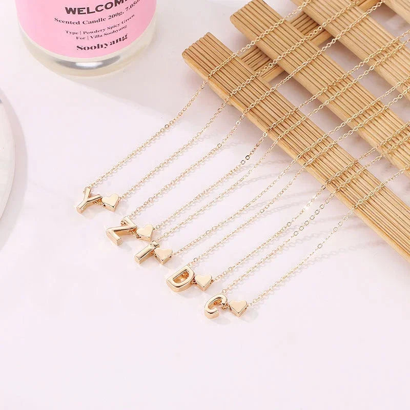 Delicate Gold Choker Necklace with Tiny Heart and Dainty Initial