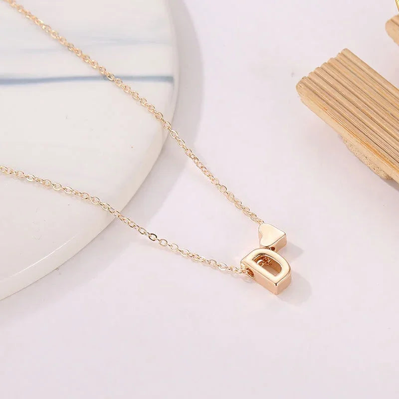 Delicate Gold Choker Necklace with Tiny Heart and Dainty Initial